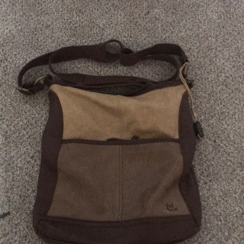 Crossbody leather and fabric bag